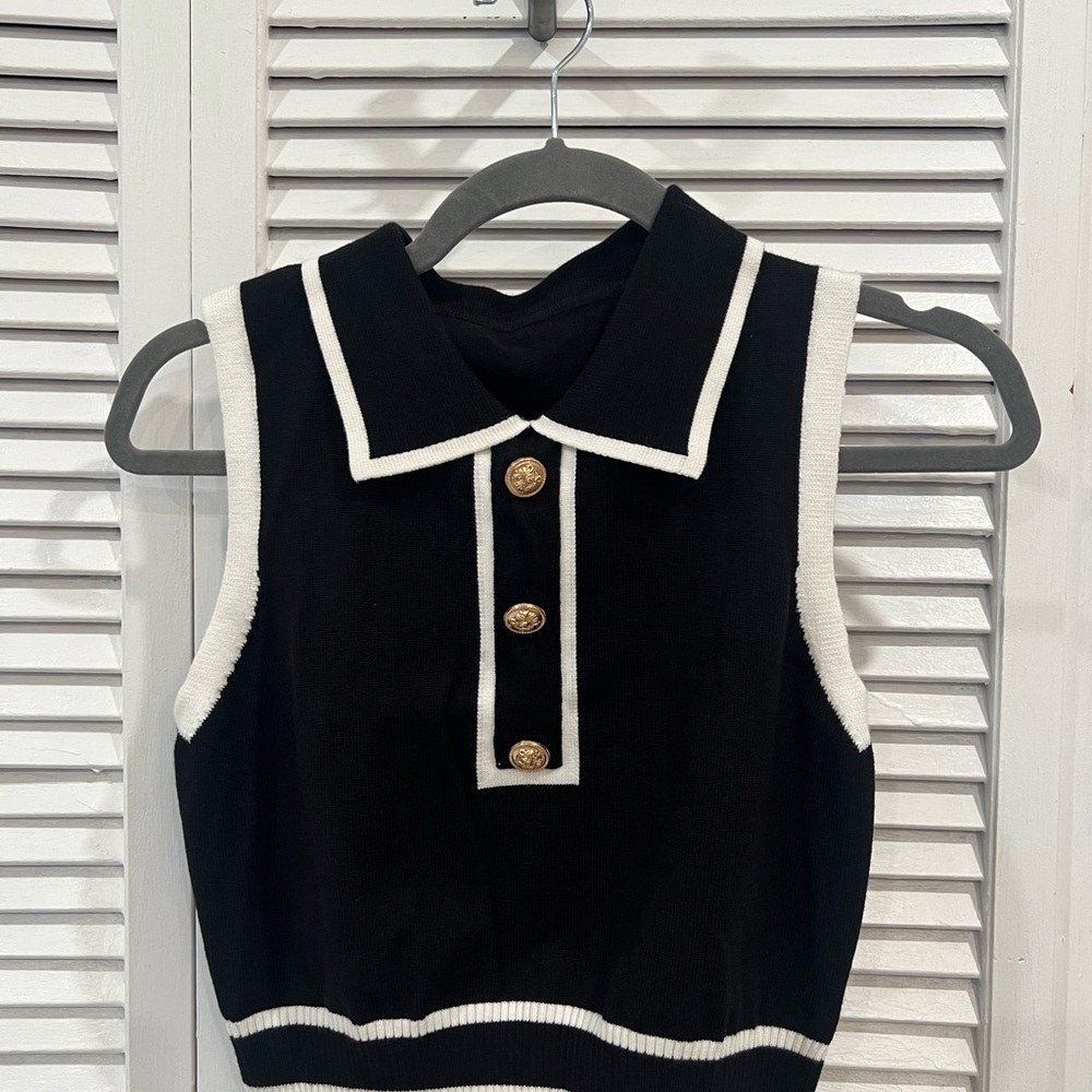 Black Sleeveless Top with White Trim and Gold Buttons